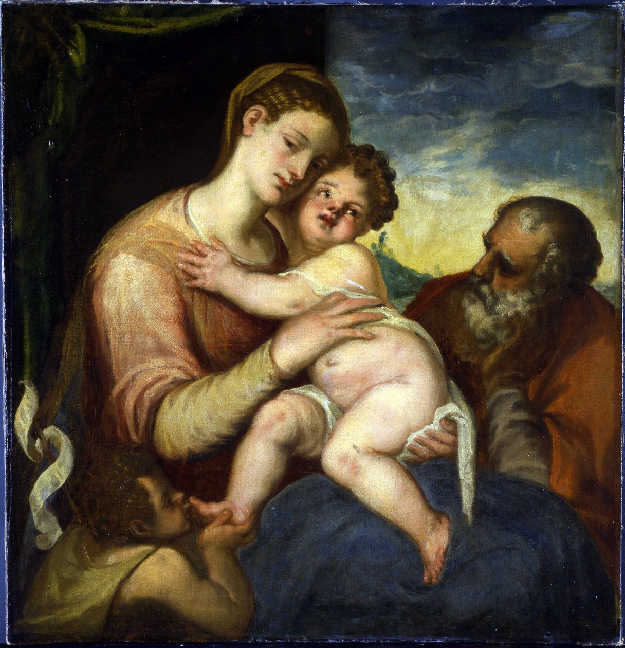 圣家族与施洗约翰 par Schiavone, Andrea (ca. 1520-1582)。 布面油画，尺寸：98x93，布拉格城堡 作者 安德里亚·夏维亚（Andrea Schiavone）