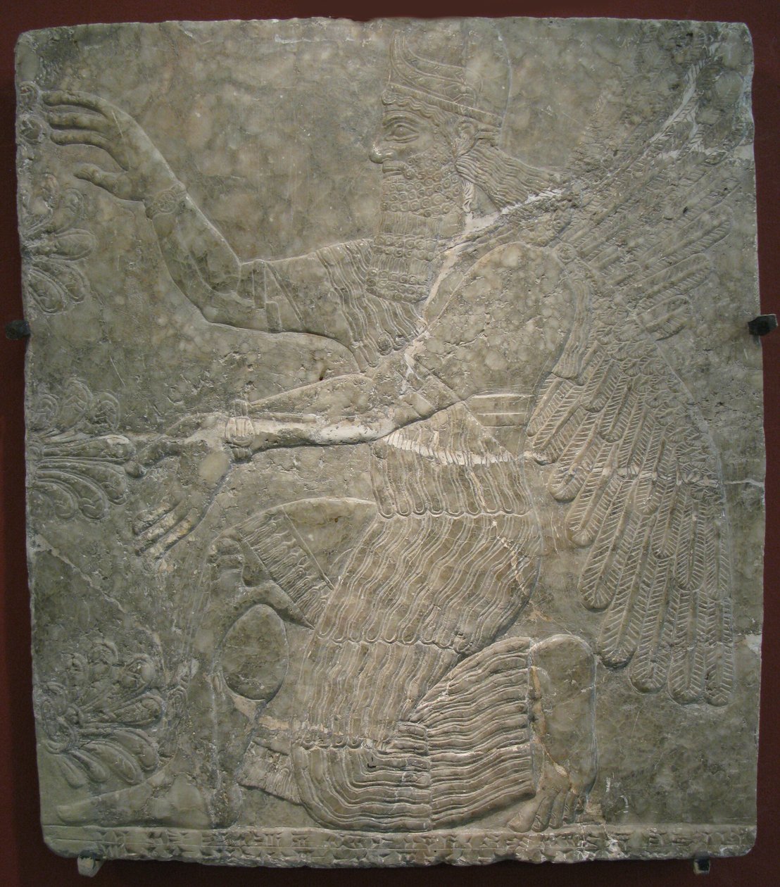 有翼的神在神圣的树旁。公元前9世纪从宁胡鲁（Nimrud）的卡鲁（Kalhu）的Ashurnasirpal II宫获得的救济 作者 亚述人