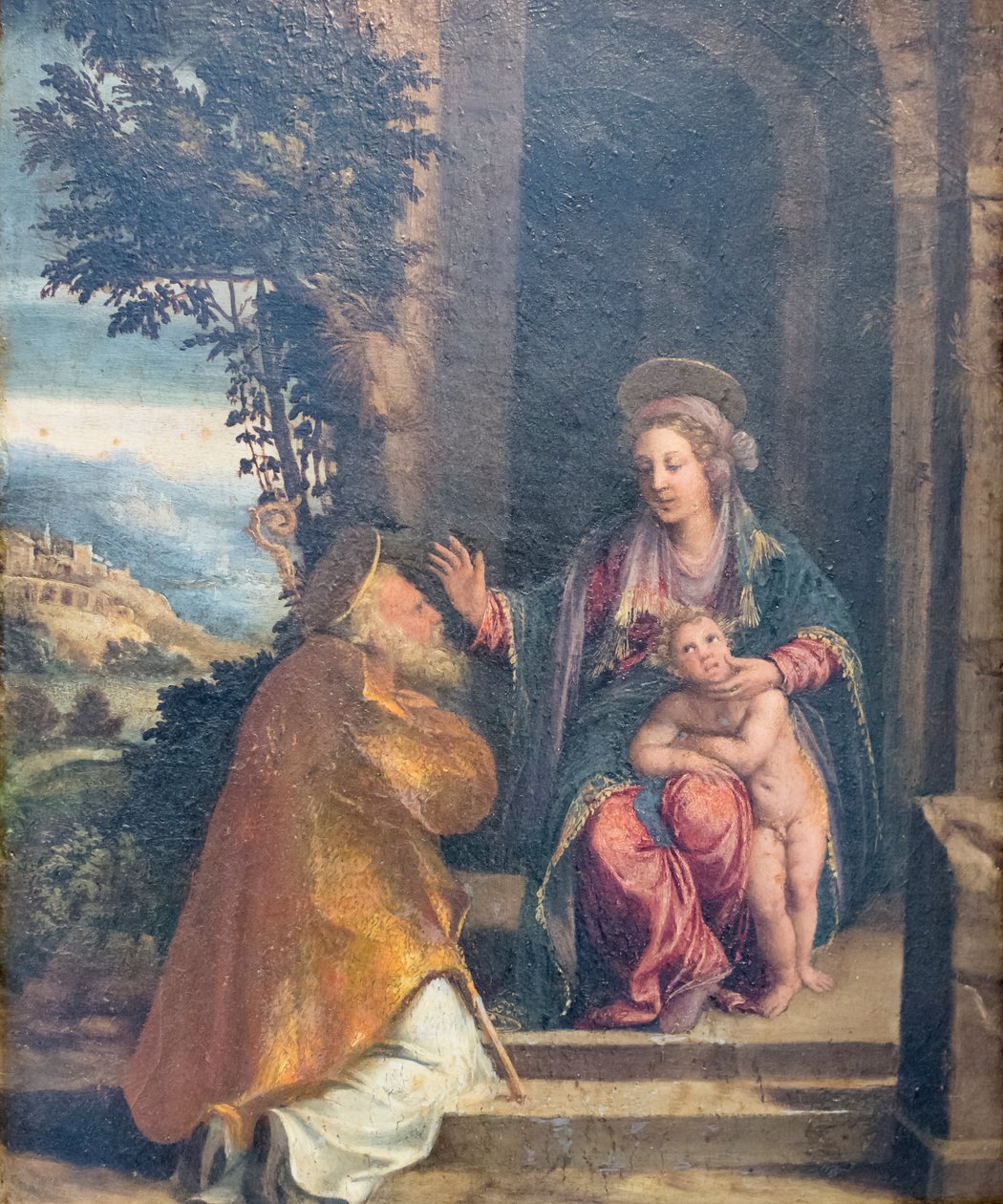 圣母与圣婴和主教 作者 Battista & Dossi Dosso (约 1486 年 1542 年) Dossi