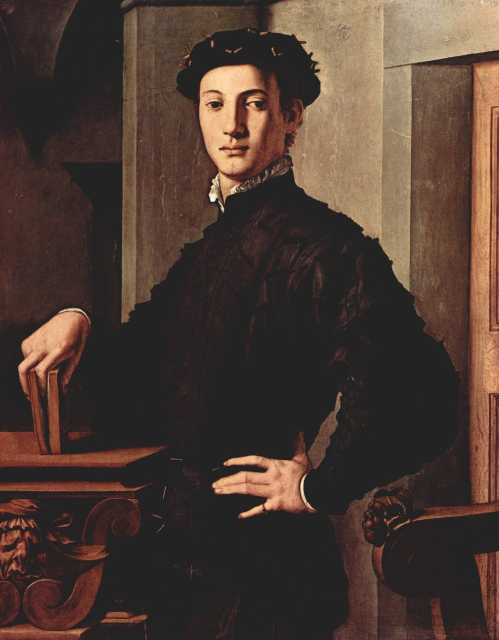 年轻人画象有书的一个年轻人的画象有书的 作者 Agnolo Bronzino