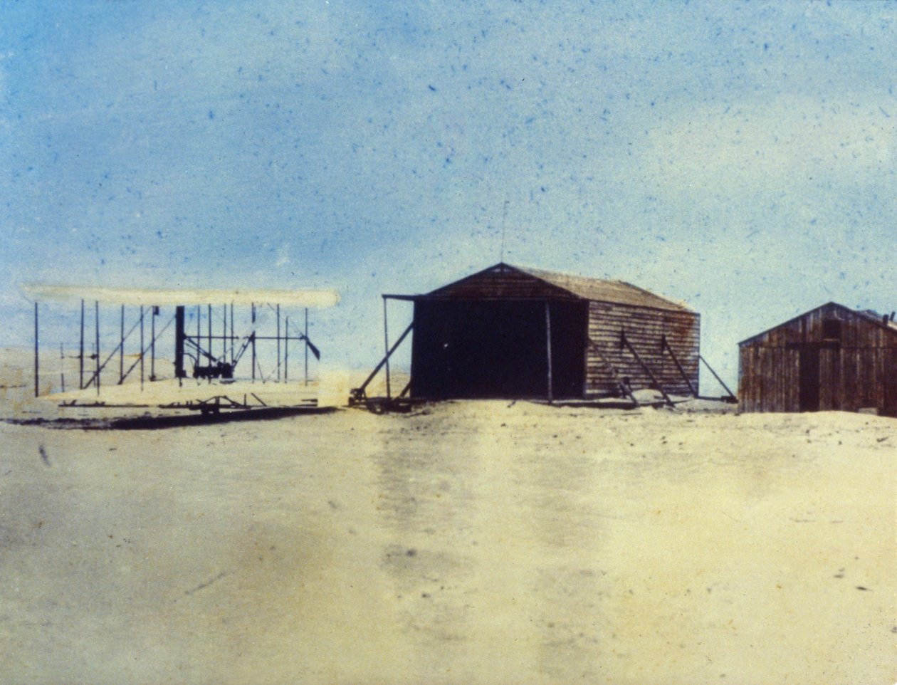 1903年的 "摩天轮 "和营地建筑，北卡罗来纳州的杀魔山。 作者 JB 和 Brown J. 和 Rowbotham