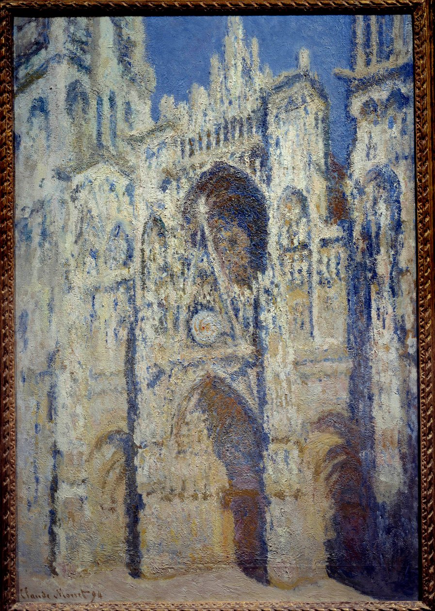 鲁昂大教堂、门户和圣罗马塔，充满阳光的和谐蓝色和金色 Claude Monet (1840-1926) 1893 年的绘画。 1.07 x 0.73 m 巴黎，奥赛博物馆 - 鲁昂大教堂和圣罗曼塔的西门。 充足的阳光。 伤害 作者 克劳德·莫奈