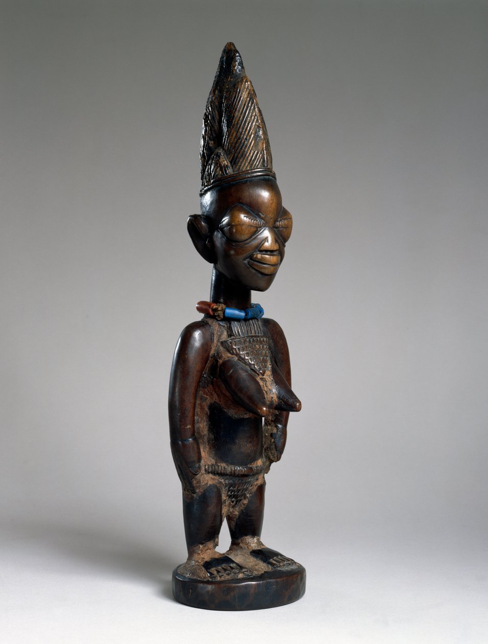 尼日利亚伊拉奥兰贡地区的双胞胎（ere ibeji），19世纪末或20世纪初（木材，玻璃珠和tukula痕迹） 作者 约鲁巴文化