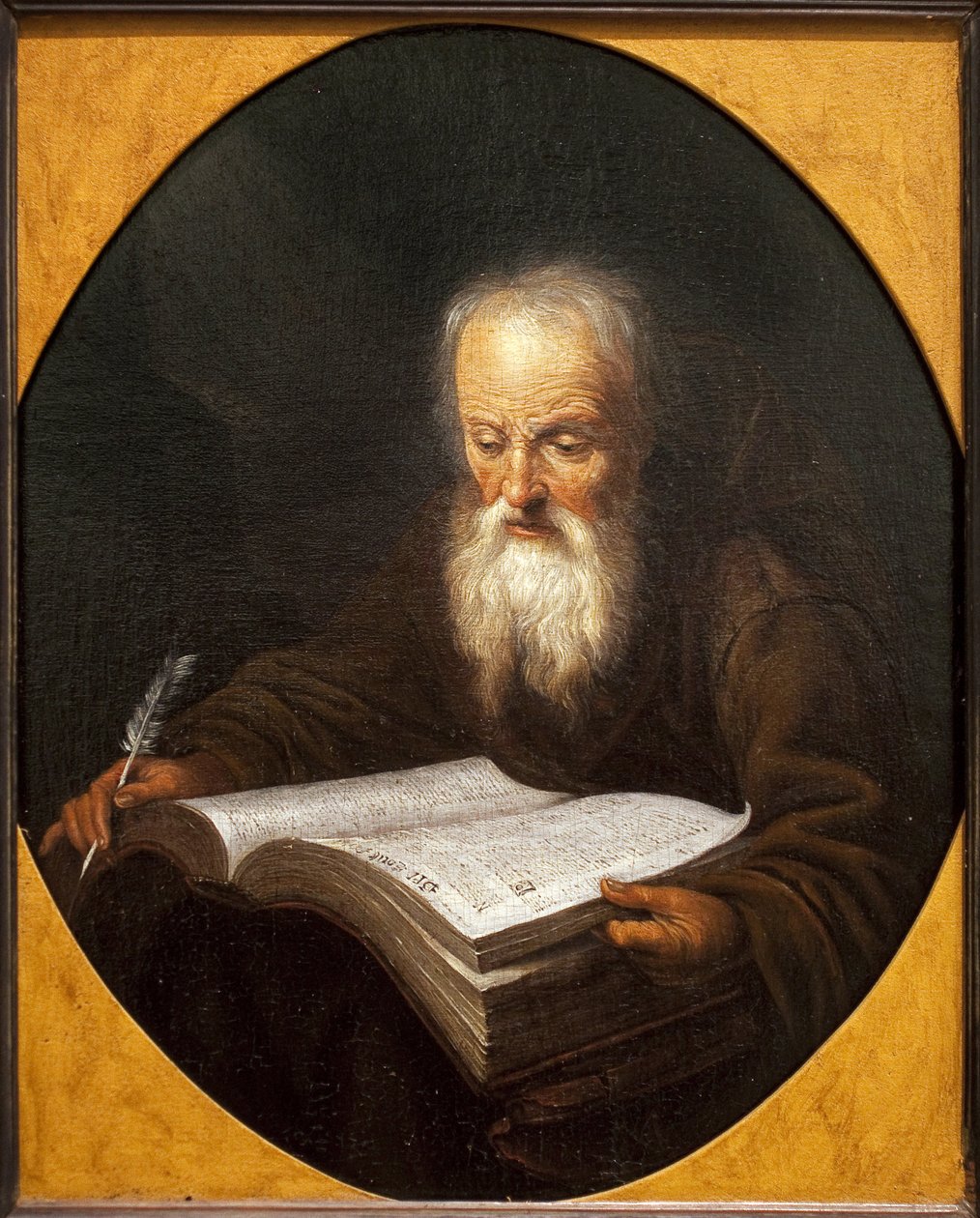 一个和尚读书，手里拿着一根羽毛。 由 Domenicus Van Tol (1635-1676) 作画，布面油画，由 Gerrit Dou (1613-1675) 绘制。 佛兰芒艺术 作者 多米尼克斯·范·托尔