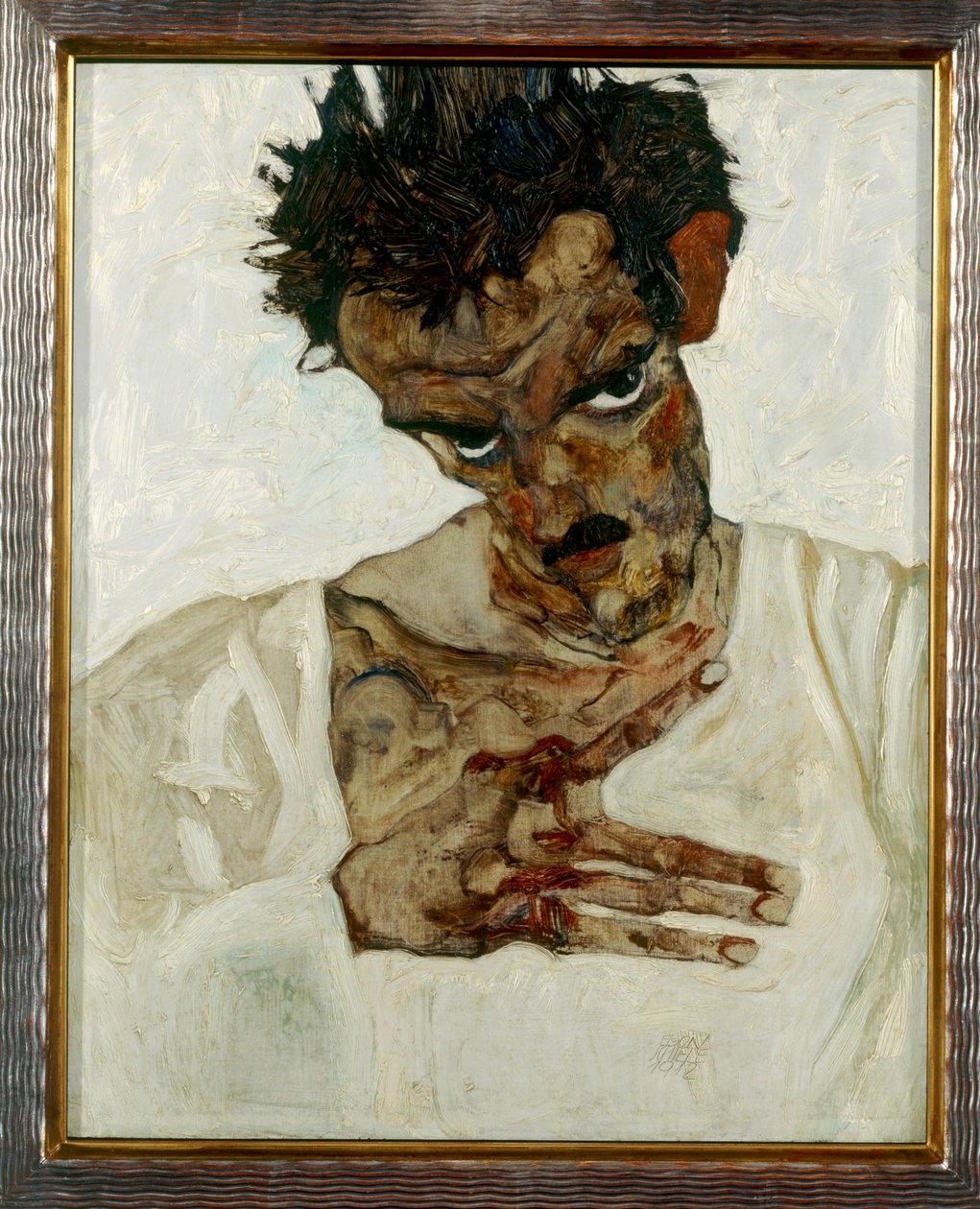 低头自画像 作者 埃贡·席勒（Egon Schiele）