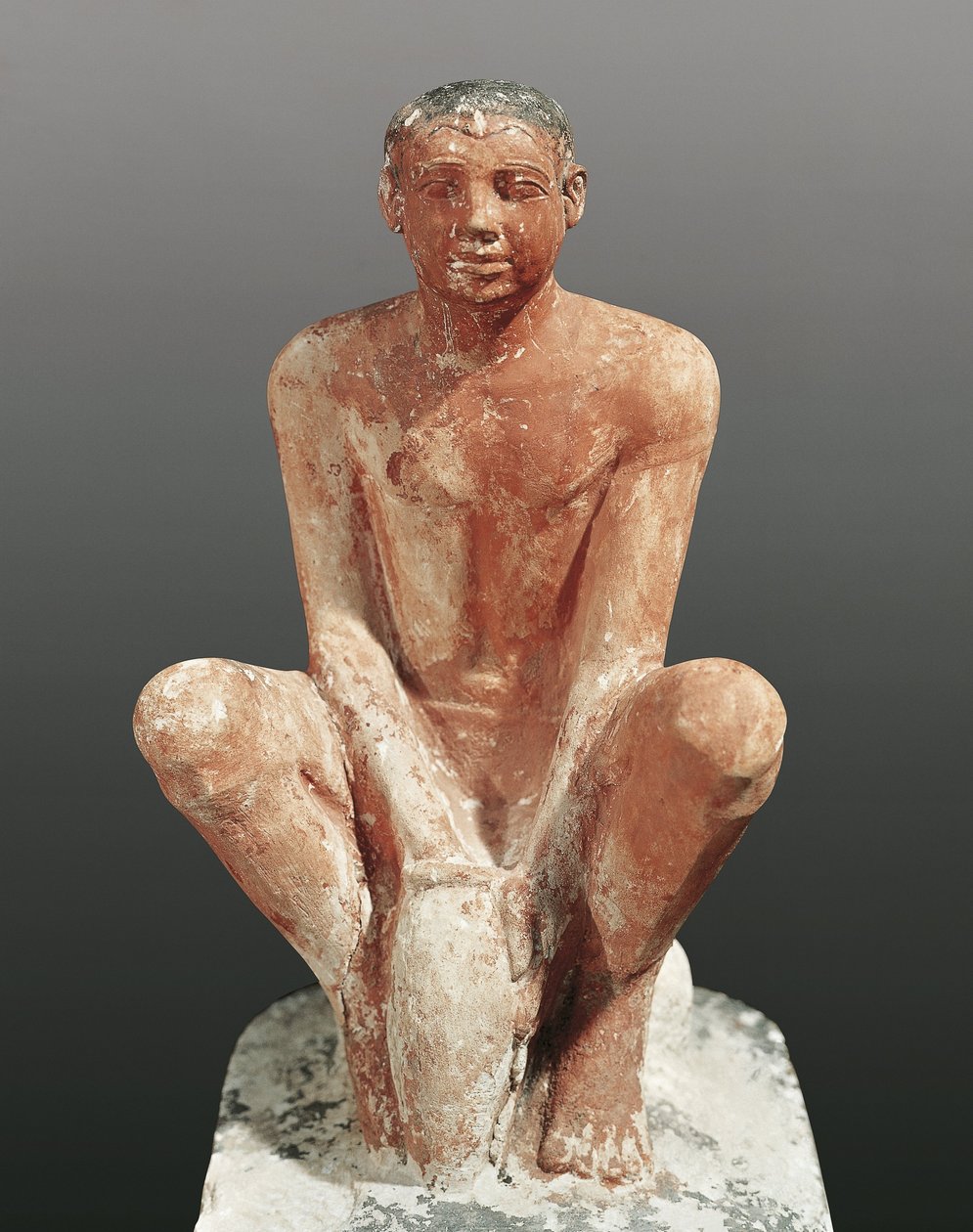Egyptian civilization, painted limestone statue depicting man modeling clay, from Saqqara, Egypt,c.2465 5th century BC (limestone) 作者 埃及第五王朝