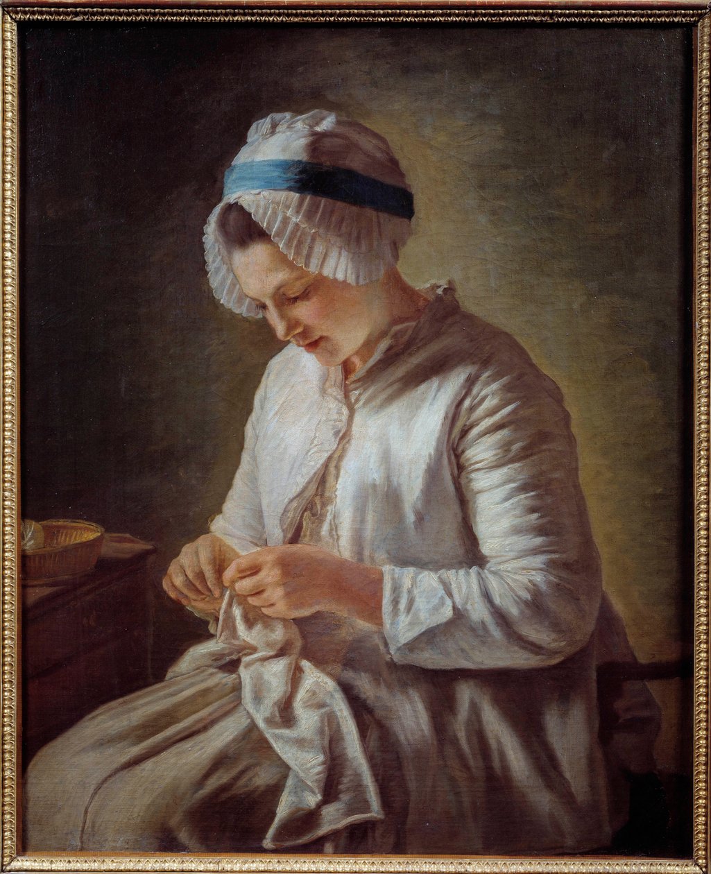 女人肖像有书《年轻女子编织》。 Francoise Duparc (1726-1778) 18 世纪的绘画。 0,78x0,64 m 马赛，美术博物馆 - 一个女人编织的肖像。 弗朗索瓦·杜帕克 (1726-1778) 的绘画 作者 弗朗索瓦·杜帕克