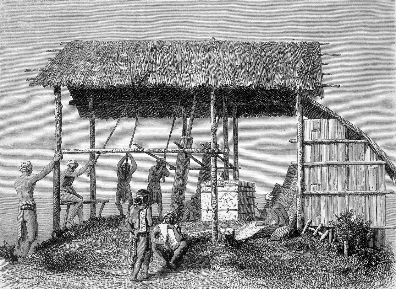 发表在1862年版《世界之旅》中的插图，描绘了婆罗洲岛上Dayaks的一个铁匠。雕刻。 作者 法语学校