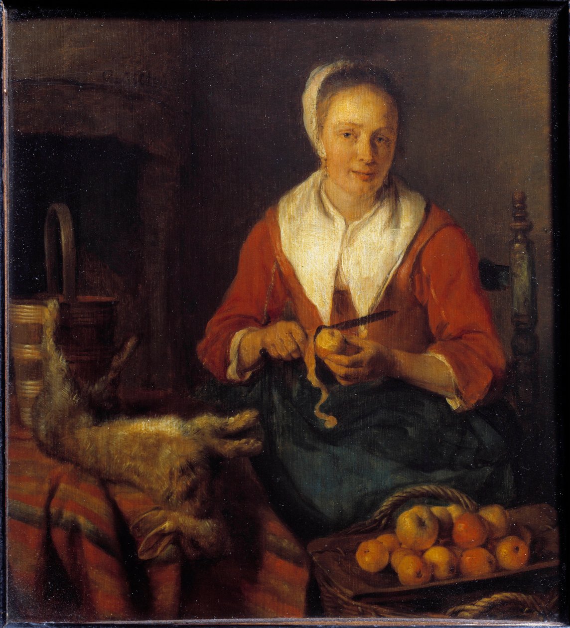 The apple peel. A woman peels apples to cook with a rabbit. Painting by Gabriel Metsu (1629-1667) Ec. Hol. 作者 加布里埃尔·梅苏