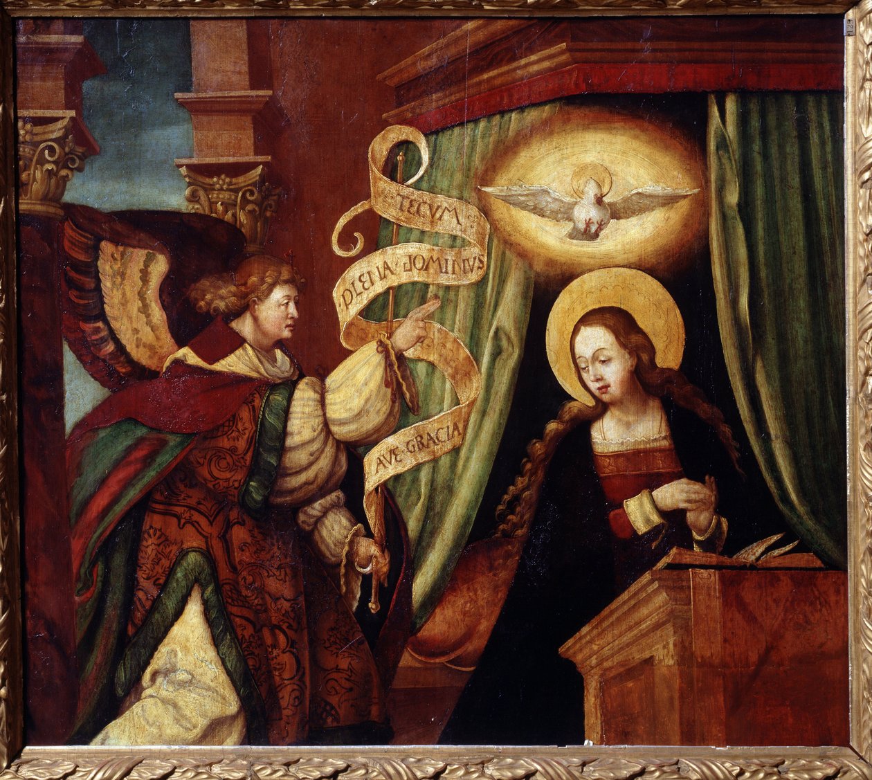 圣母领报。天使长加百列带来了拉丁语信息："Ave gratia plena Dominus tecum"（万福啊，充满恩典的主与你同在）（万福玛丽亚的开头）。德国绘画大师的作品（16 世纪）。油画 作者 德国学校