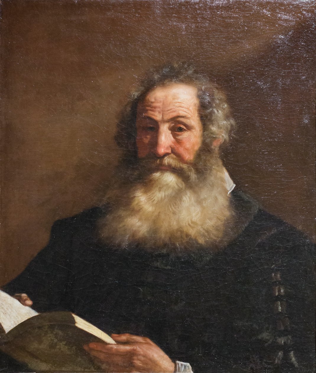 手持书籍的老人肖像 作者 圭尔奇诺 (1591-1666)