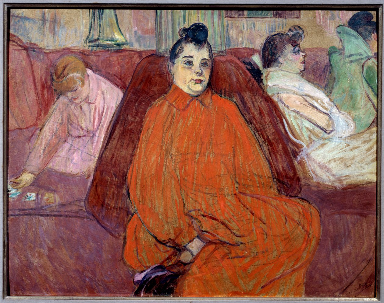 在客厅里，坐在妓院里的沙发上的妓女在等客人。 Henri de Toulouse Lautrec的绘画 作者 亨利·德·图卢兹·劳特雷克