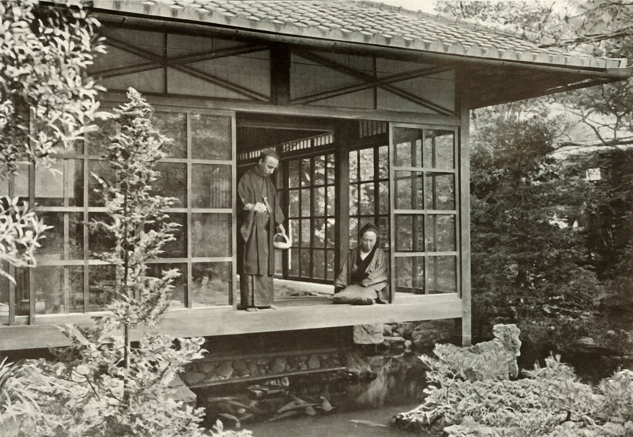 纳川川（Namikawa San）喂养鲤鱼，1910年。 作者 赫伯特·庞廷