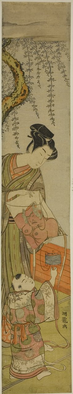 年轻人为孩子放风筝 作者 oda田K