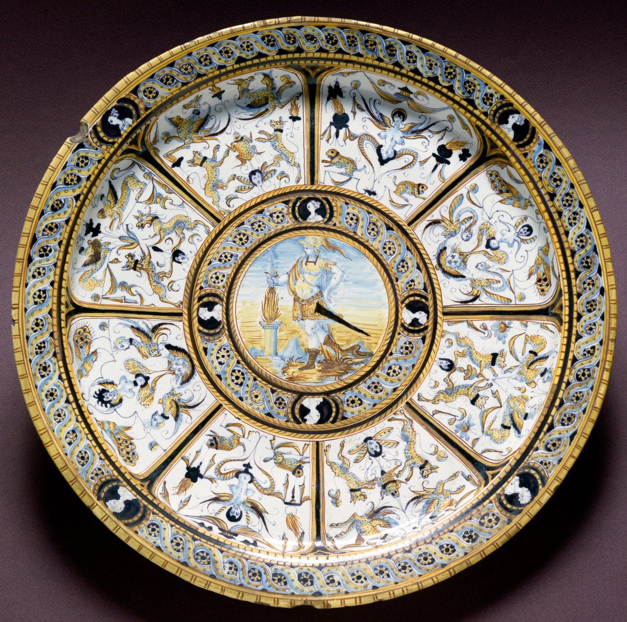 代表罗马英雄 Scaevola (Muzio Scevola) 意大利乌尔比诺生产的陶瓷板。 约 1590 佛罗伦萨，巴杰罗国家博物馆 作者 意大利学校