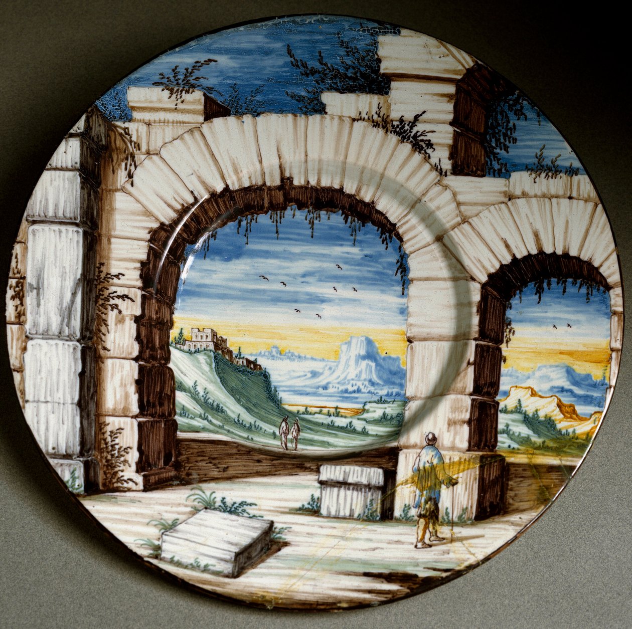 废墟和风景。 意大利安加拉诺生产的陶瓷板。 大约 1650 年佛罗伦萨，Museo Nazionale del Bargello 作者 意大利学校