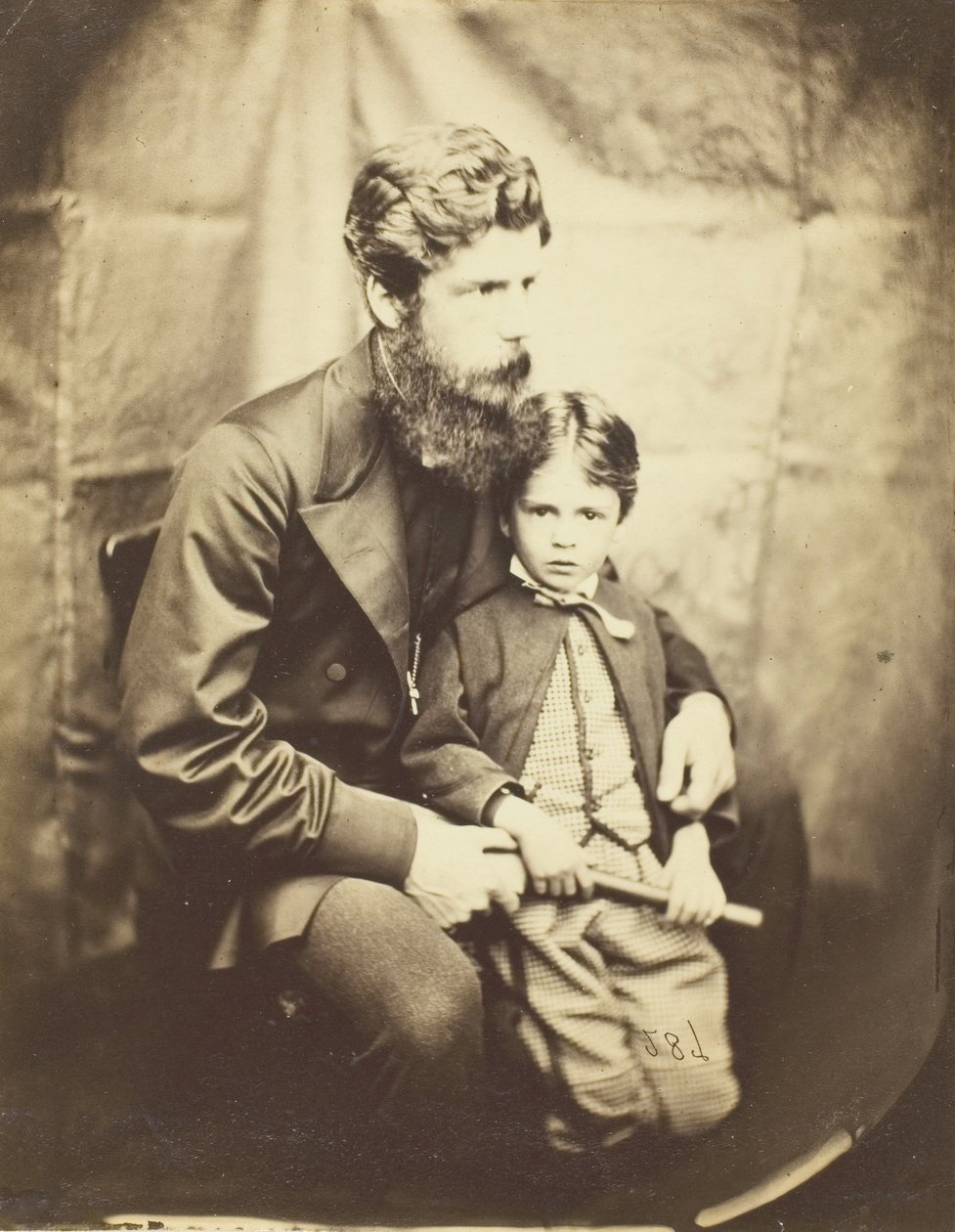 James Langton Clark牧师和儿子Charles Robin，1864年。 作者 刘易斯·卡洛尔