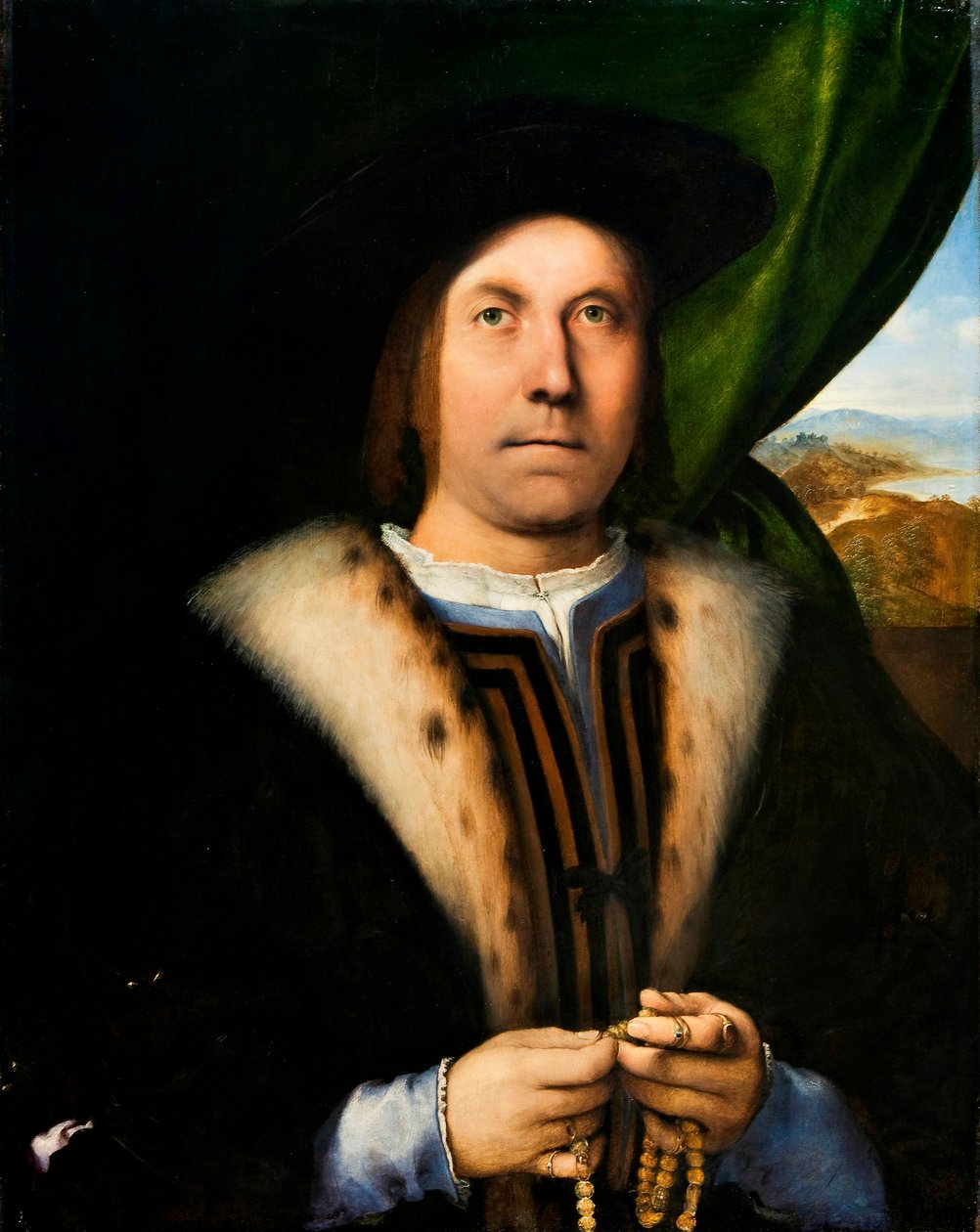 手持玫瑰经的男子肖像》，约 1520 年（油画板） 作者 洛伦佐·乐透（Lorenzo Lotto）