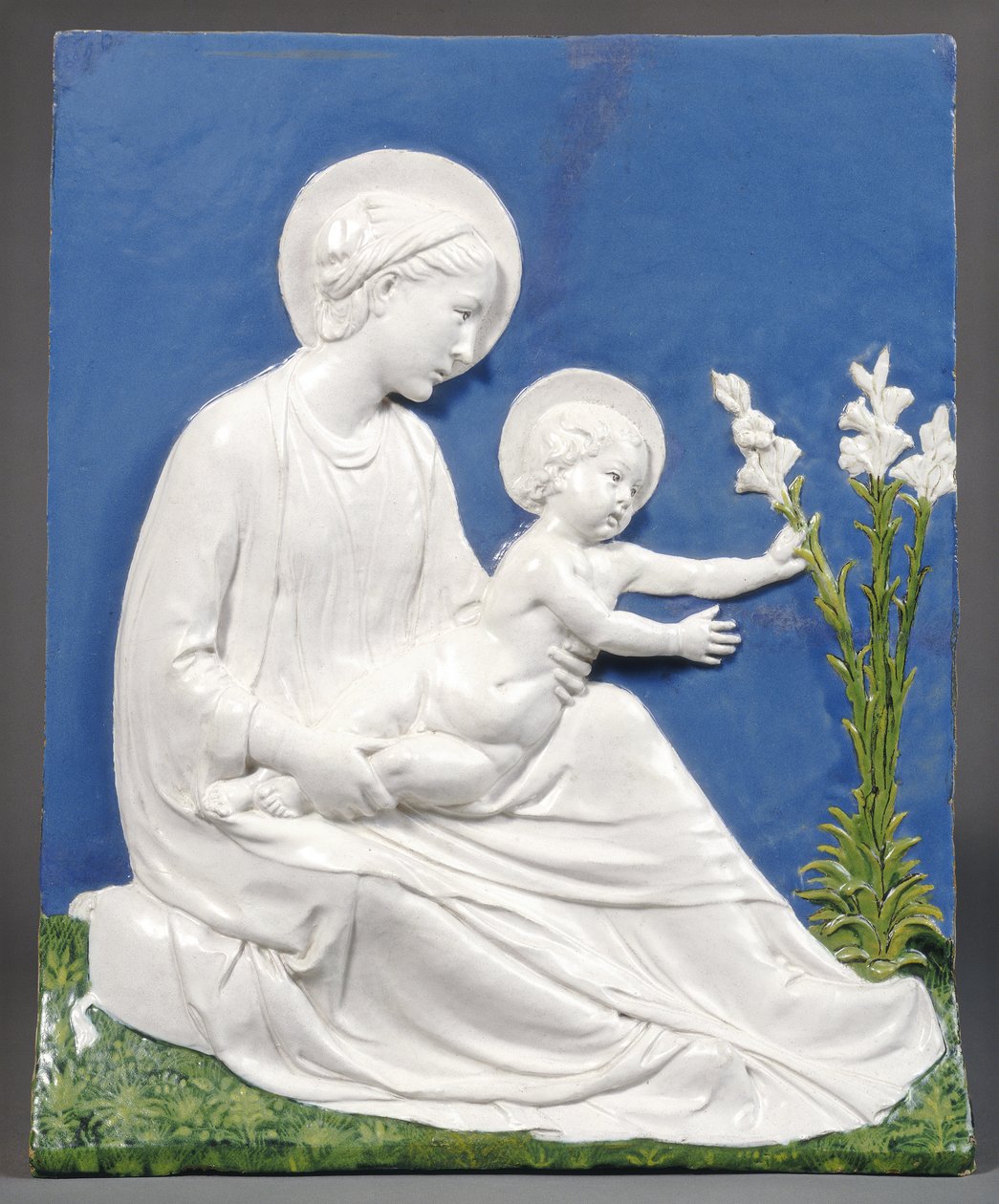 Madonna und Child，c.1475（釉面赤土陶器） 作者 卢卡·德拉·罗比亚