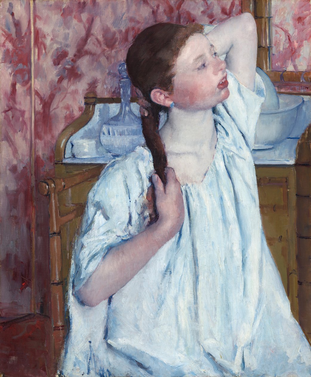 女孩整理她的头发，1886年。 作者 玛丽·卡萨特