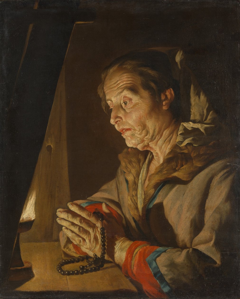 老妇人祈祷，1630年代末或1640年代初。 作者 马蒂亚斯·斯托默（Matthias Stomer）