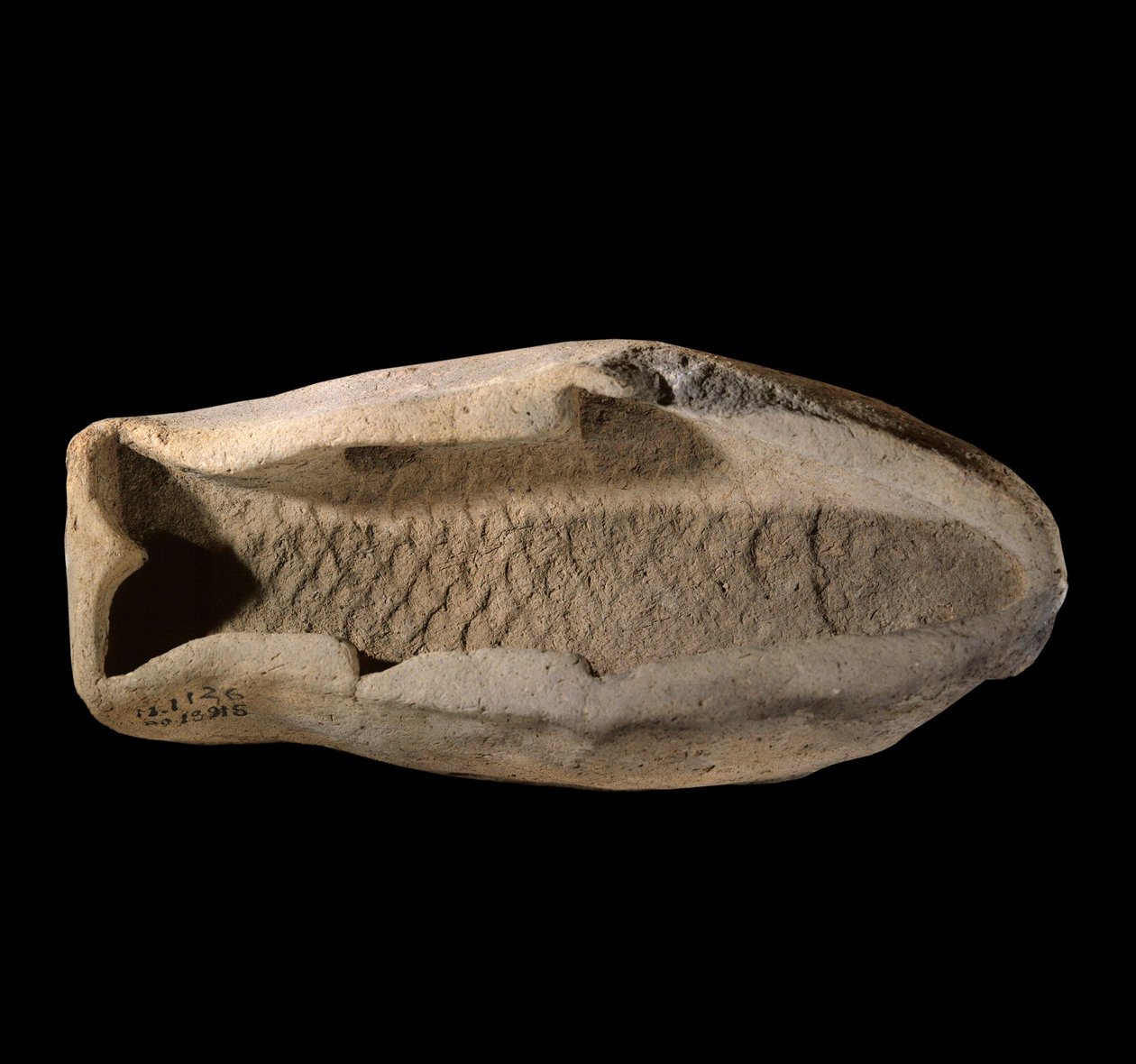 Mesopotamie: terracotta mold in the shape of fish. Around 1800 BC. From the royal dishes of the Palace of King Zimrilim a Mari. Paris, Louvre Museum 作者 美索不达米亚