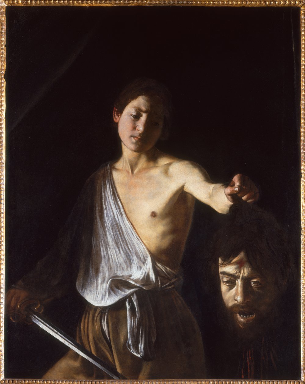 大卫与歌利亚的头，1609-1610。 作者 米开朗基罗·卡拉瓦乔