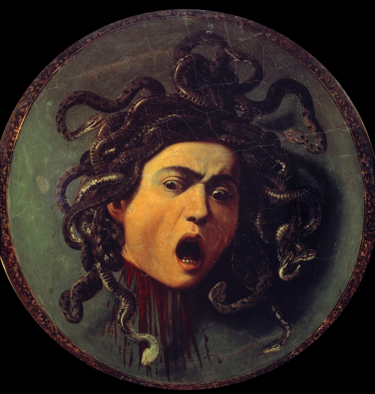 Head of Meduse. Painting on the reverse of a shield covered with canvas. Symbol of the victory of reason over the senses referring to the myth of Persee and Meduse (Gorgona). Painting by Michelangelo Merisi called The Caravaggio or il Caravaggio (1571-1610 作者 米开朗基罗·梅里西·达·卡拉瓦乔