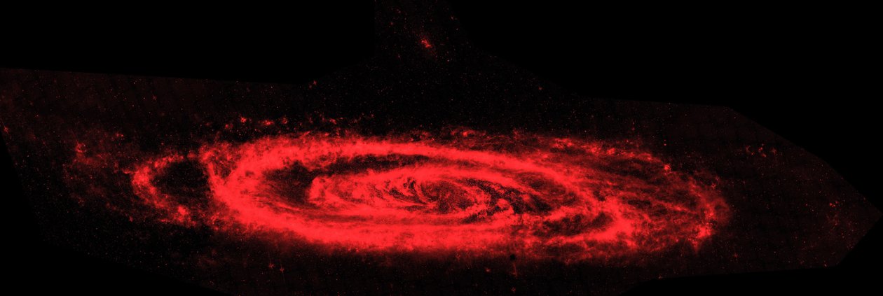 斯皮策太空望远镜红外合成图像如何仙女座星系。主要图像突出了星系波涛汹涌的尘埃（红色）和老星的光滑海洋之间的对比。信用NASA 作者 国家航空航天局国家航空航天局