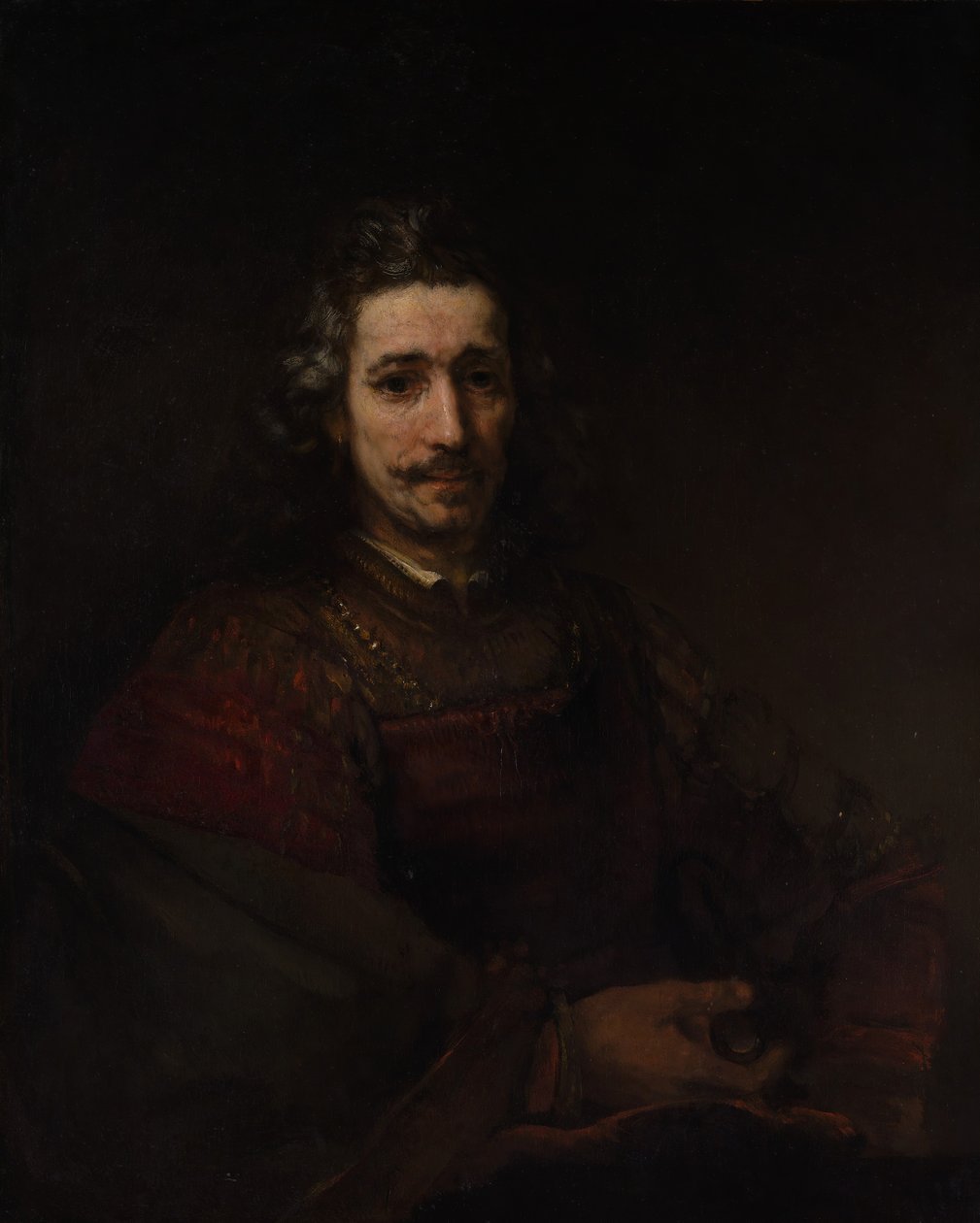 戴放大镜的男人，1660年代初期。 作者 伦勃朗·范·赖恩