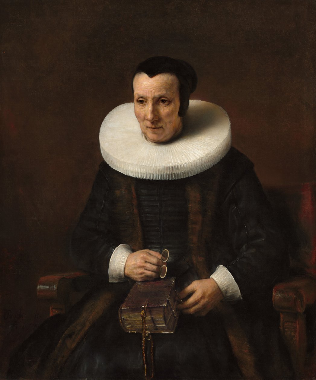 一个拿着书的老太太 作者 Rembrandt van Rijn 和工作室
