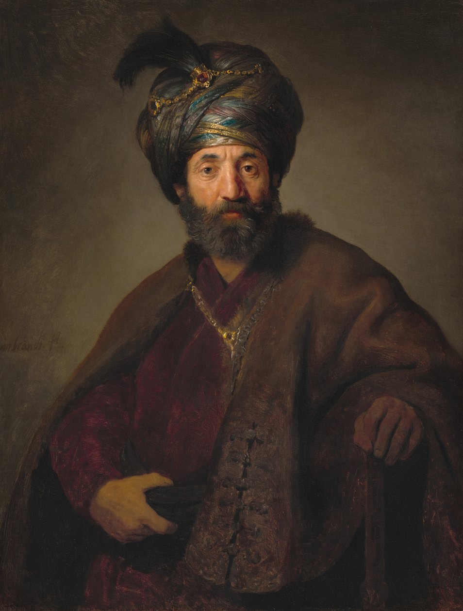 穿着东方服装的男子 作者 Rembrandt van Rijn 和工作室