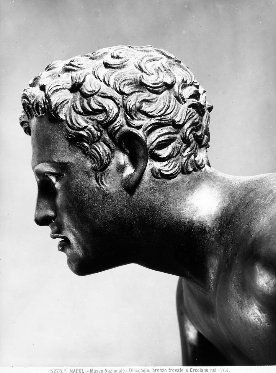 Discobolus 的镀金青铜脸 作者 罗马罗马
