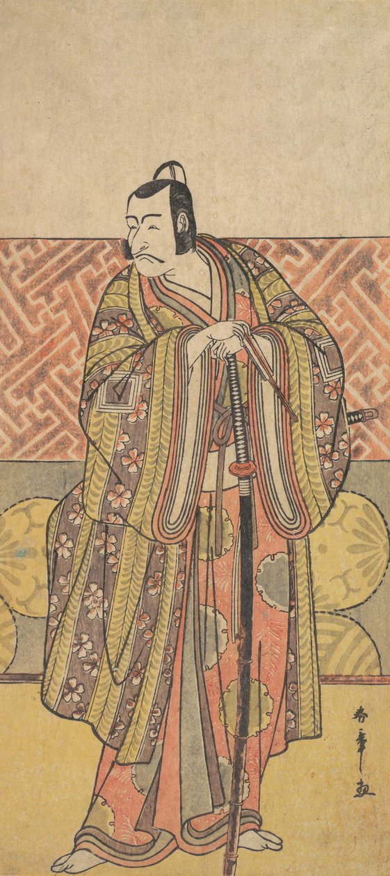 市川团十郎五世饰演的工藤素贞，衣着华丽，倚靠在剑上，18世纪末。 作者 春庄