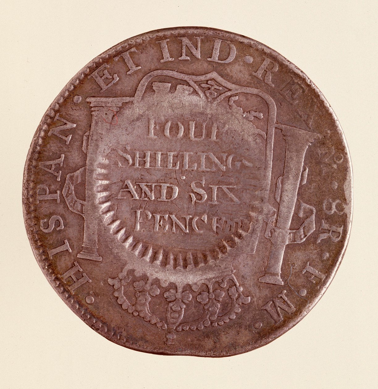 Silver coin (8 reales) from Spain: reign of Charles III (1759-1788). 1777 with countermark of 1787. Diam. 3.9 cm Naples, museo archeologico 作者 西班牙语学校