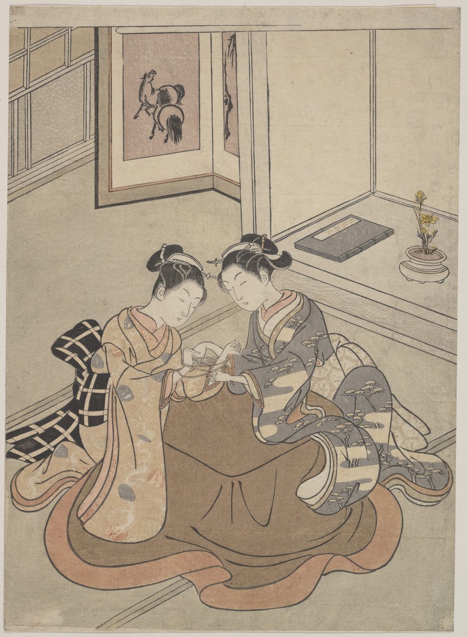 两个年轻女性坐在一个Kotatsu玩猫的摇篮 作者 铃木春信