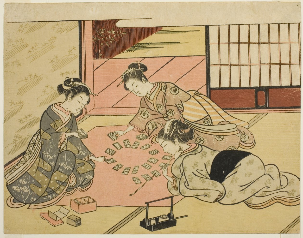 年轻女性玩诗歌卡 作者 铃木春信