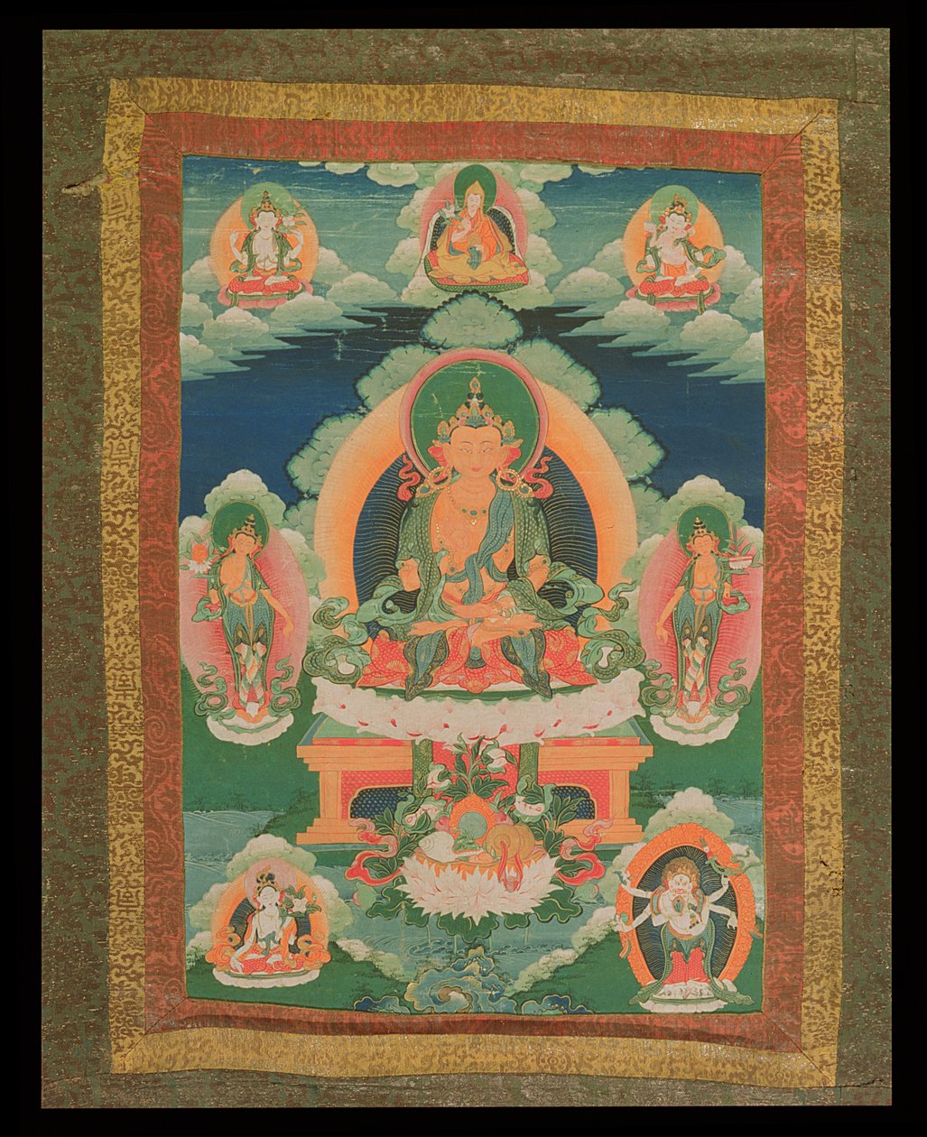 唐卡画描绘了一个身份不明的菩萨，周围有各种各样的菩萨，神灵和神圣的人，来自拉萨，1780  -  1880年（纸上装有丝绸） 作者 藏族学校