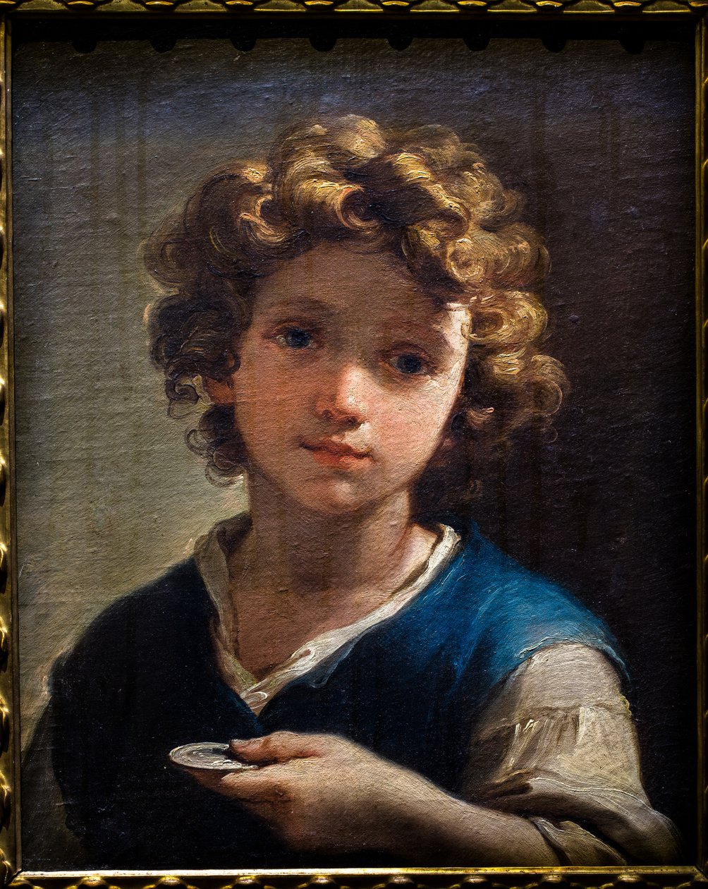 手持硬币的小男孩半身像，约 1777 年（布面油画） 作者 乌巴尔多·甘多尔菲