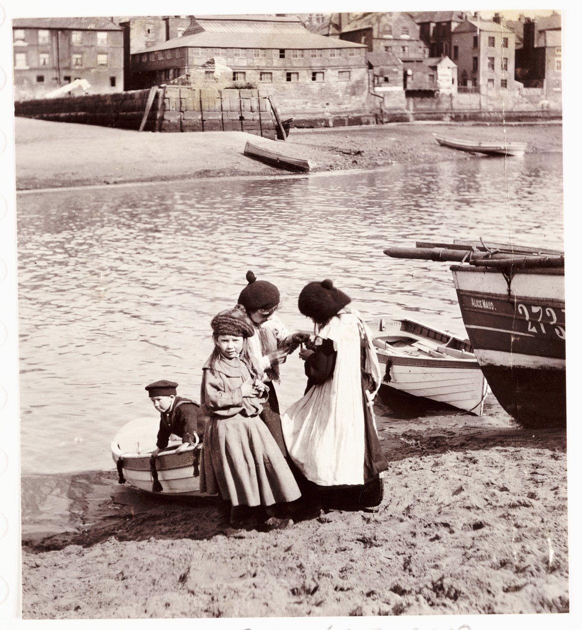 Children playing by the water