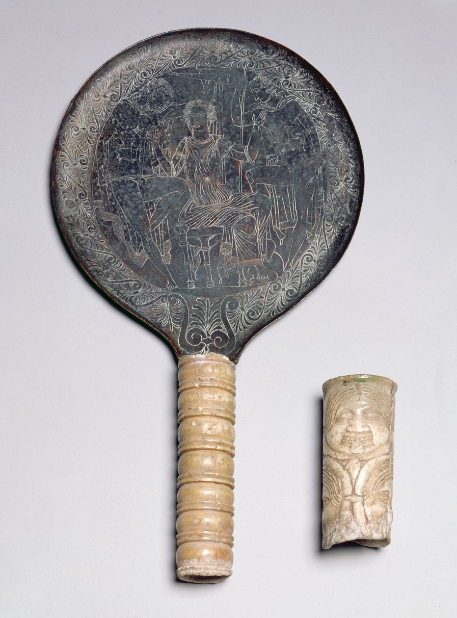伊特鲁里亚象牙处理镜子，刻有奥德修斯威胁 Circe 的装饰； 象牙 Gorgoneion 把手，公元前 4 世纪（青铜和象牙） 作者 不明