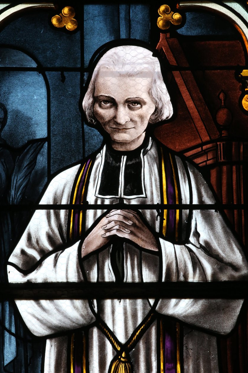 Mezilles church. Stained glass window. Saint John Mary Vianney. Cure of Ars. France - abbe Jean Marie Vianney (Vianey, Viannay, Viennet), dit le Cure d
