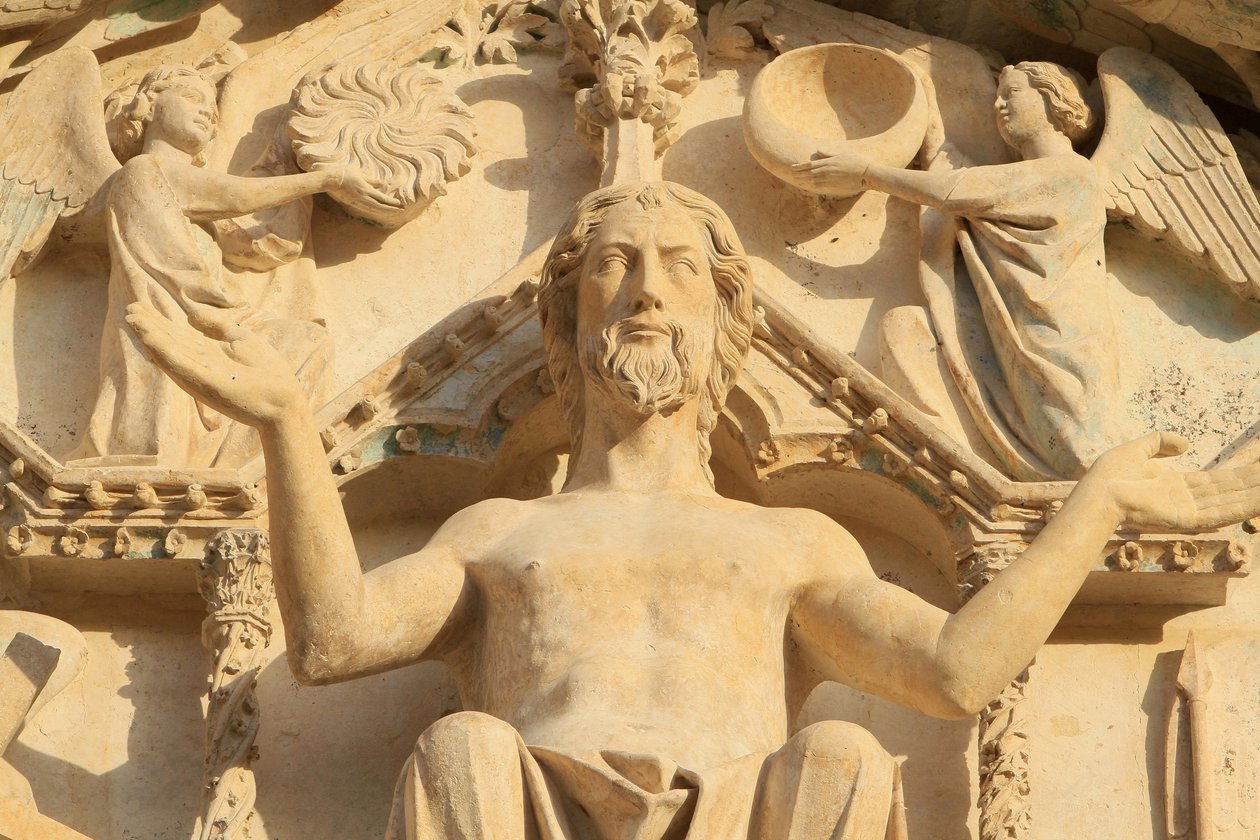 Sculpture of the Christ seated on a throne. The Last Judgment. Tympanum of the western central portal. St. Stephen