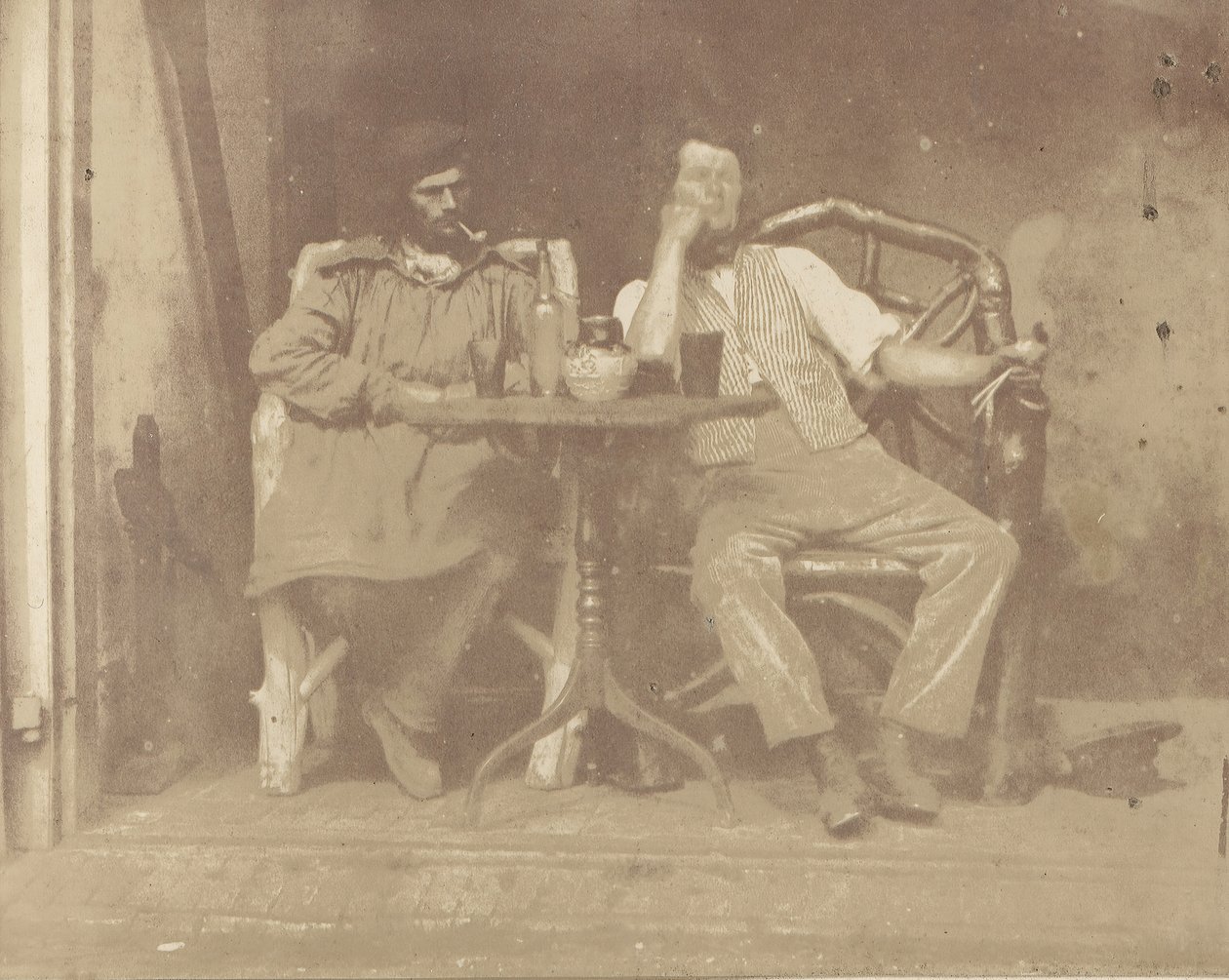 两个人坐在桌子前，1850年代。 作者 不明