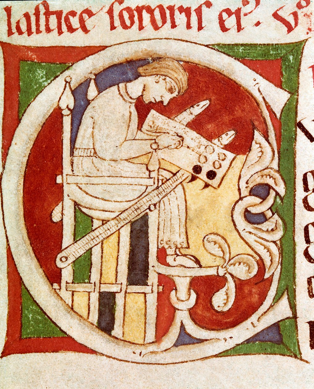 Letter C adorned with a monk writing on a desk. Miniature from “” Vitae sanctorum”” (Life of the Saints) 12th century Coimbre, university library 作者 未知艺术家