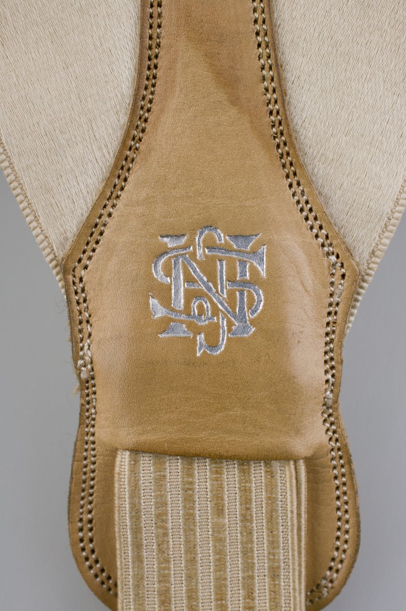 Suspenders, c.1880 (detail view), Emroidered white satin, leather, silver, Maker unknown 作者 未知艺术家