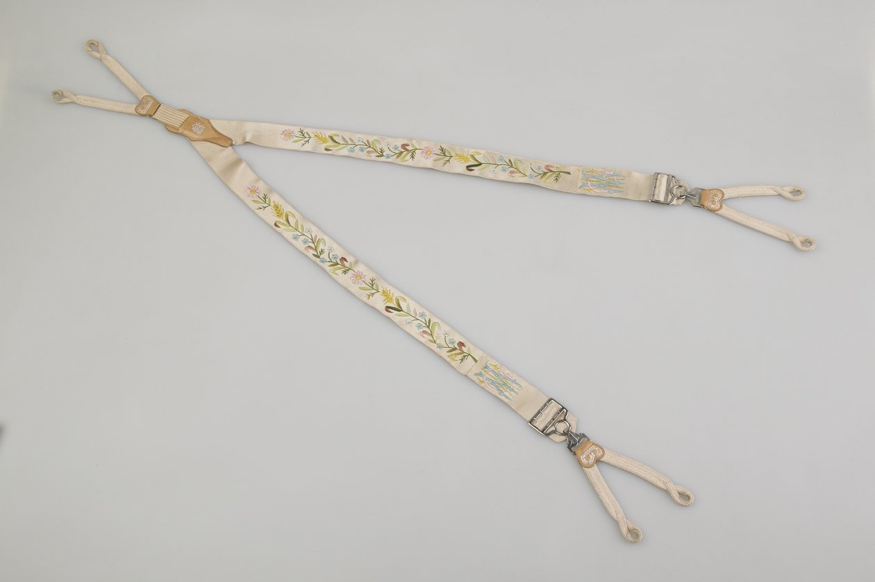 Suspenders, c.1880, Emroidered white satin, leather, silver, Maker unknown 作者 未知艺术家