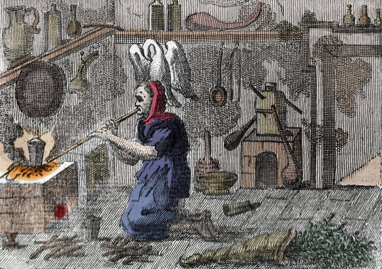 实验室里的女巫正在准备魔药，右边是一只装满魔药的角。 16 世纪的雕刻 作者 未知艺术家