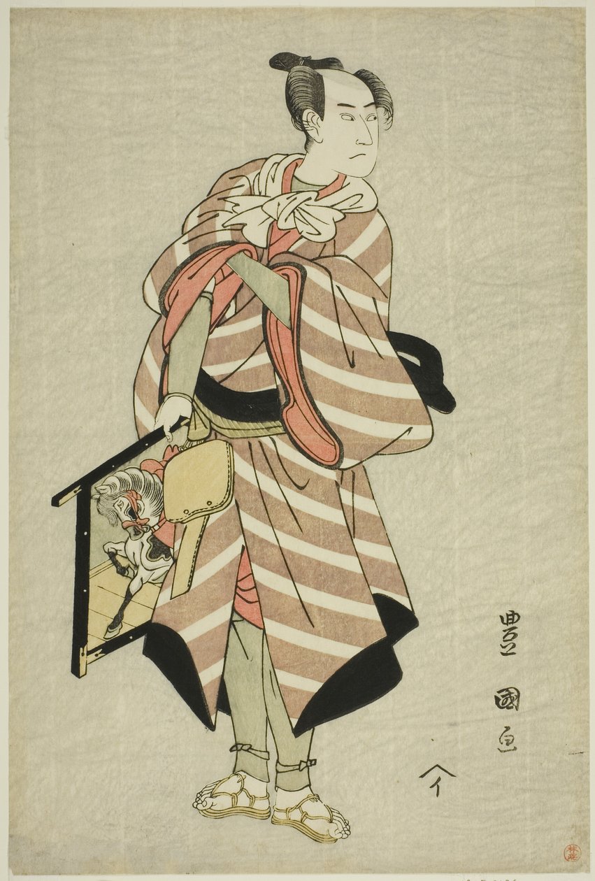 泽村宗十郎三世在 1797 年 11 月于 Kiri 剧场上演的戏剧《宫舞武藏之神垣》中饰演驮马人 Muchizo。 作者 歌川丰国一世