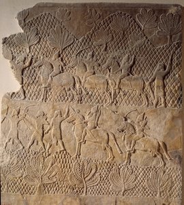 东方的古代艺术：战斗场景。亚述Assurbanipal宫的低浮雕（公元前7世纪）。巴黎，卢浮宫博物馆 作者 亚述人